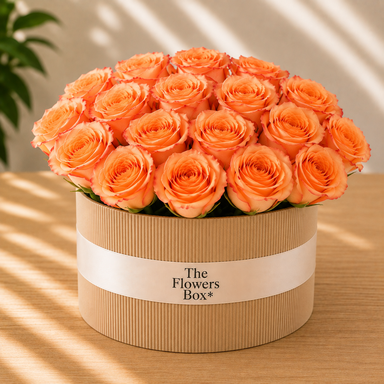 Caja floral de flores rosas